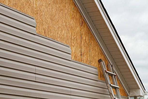 Professional Siding Repair technician working in Montgomery, TX